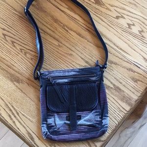 Pistil brand purse. Used twice. Zippered top.one zippered pocket inside